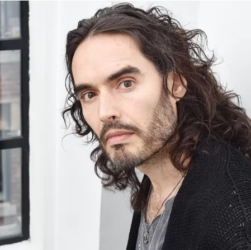 Russell Brand blamed for rape by four ladies