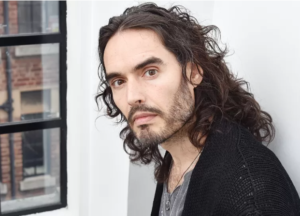 Russell Brand blamed for rape by four ladies